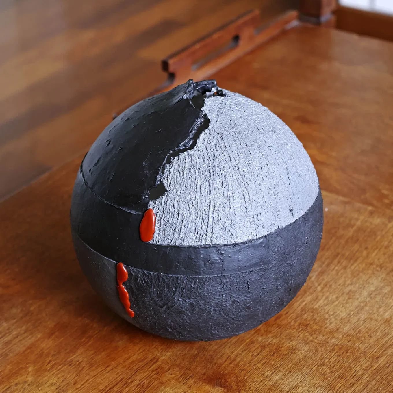 #114 Black Sphere with Red Lacquer Accents