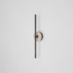 Essential Stick in Bronze and Travertine