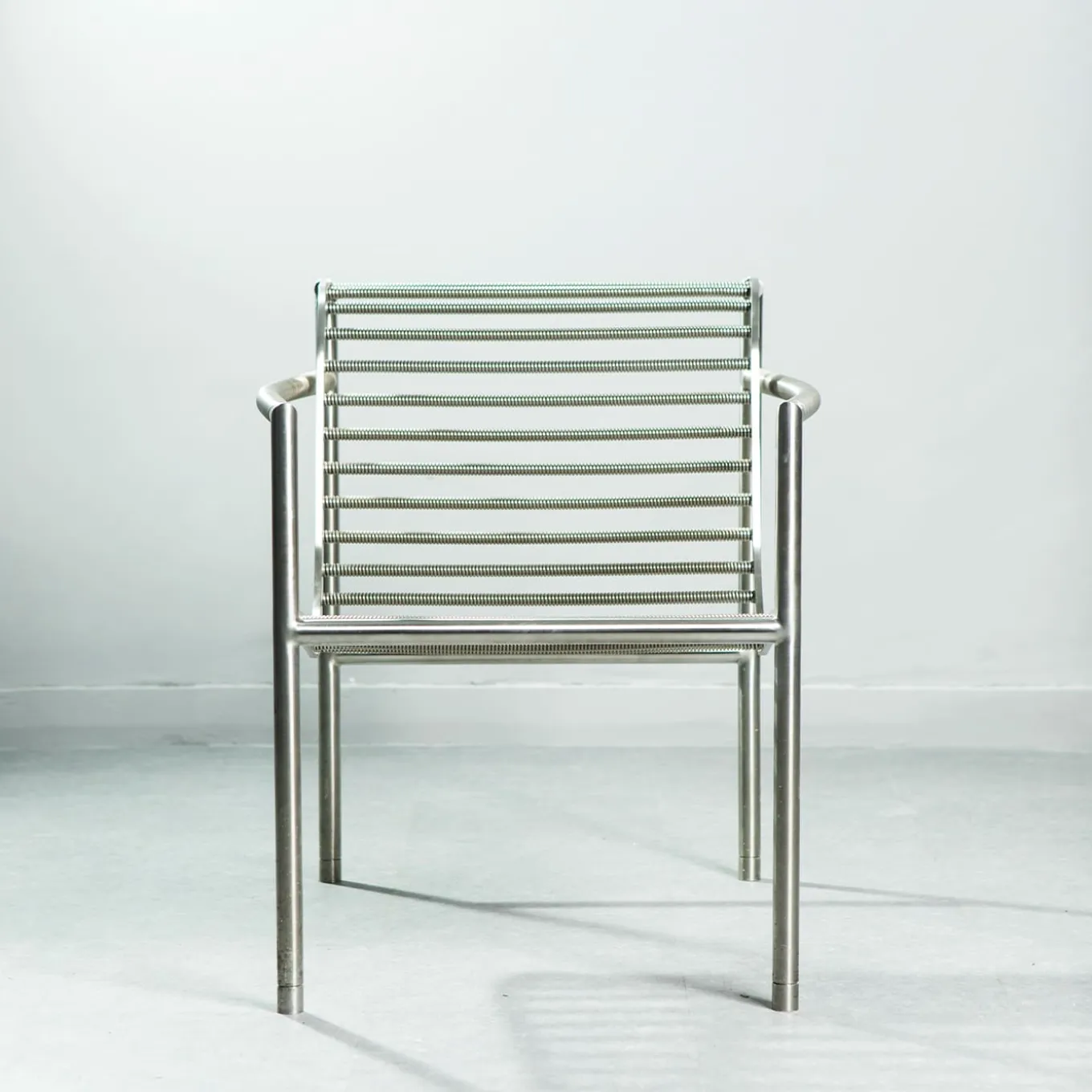Insidie Gray Stainless Steel Lounge Chair