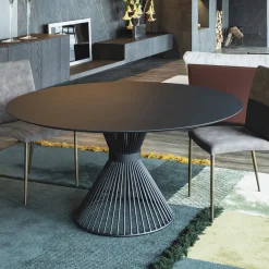 Lama Round Dining Table Decorated With Dark Brown Spatulated Resin