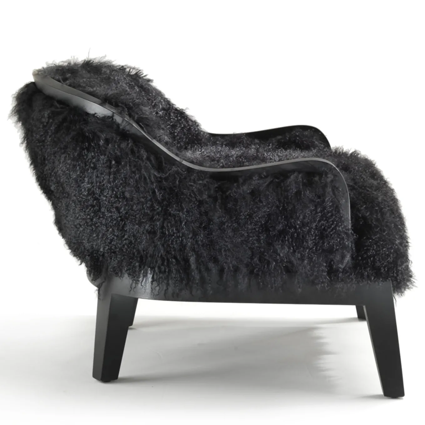 Madama Lounge chair by Archer Humphryes Architects