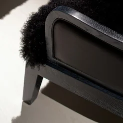 Madama Lounge chair by Archer Humphryes Architects