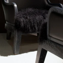 Madama Lounge chair by Archer Humphryes Architects