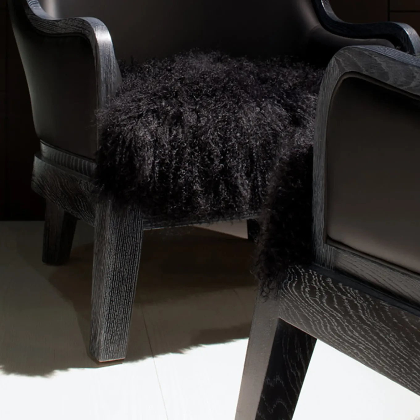 Madama Lounge chair by Archer Humphryes Architects