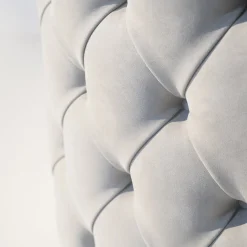 Petra light gray capitonnè armchair