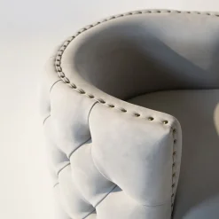 Petra light gray capitonnè armchair