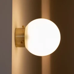 Ro' PS Round Milky Glass With Gold Finish Brass Base Applique