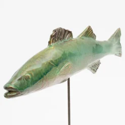 Slim green seabass sculpture