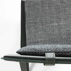 Thea gray fabric and black leather Soft Armchair