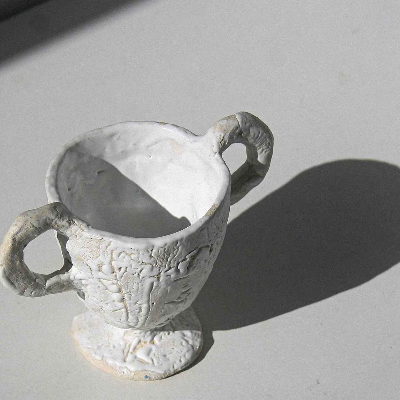 White Footed Cup with Handles